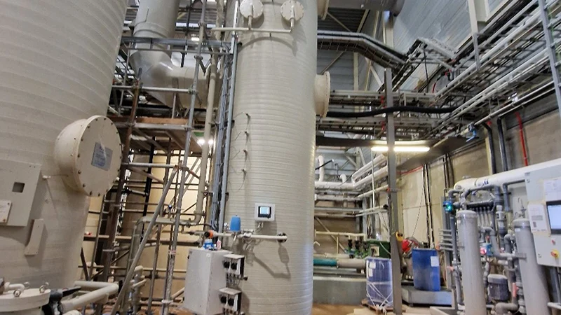 Ammonia stripper column in a process hall