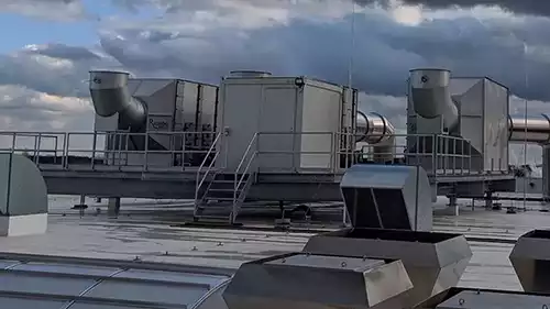 Odor scrubbers for drying ovens on a roof