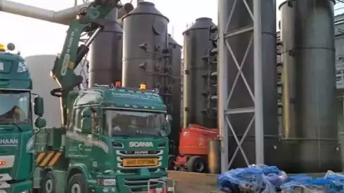 Scrubber columns being delivered by crane truck